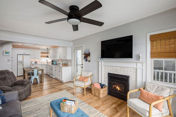 Fireplace, Interior, Kitchen, Living room, Recessed Lighting, Stainless Steel Appliances, Wood Texture Flooring