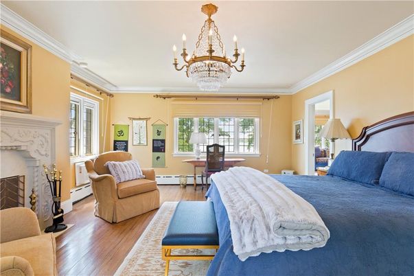 Bedroom, Chandelier, Fireplace, Interior, Wood Texture Flooring