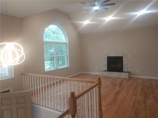Empty room, Fireplace, Interior, Pendant Lights, Recessed Lighting, Wood Texture Flooring