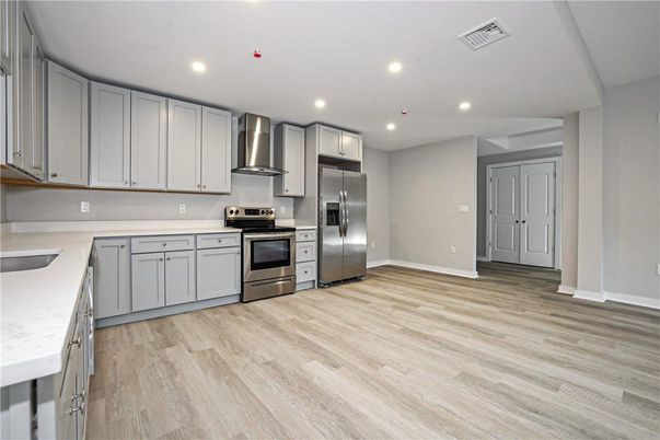 Interior, Kitchen, Recessed Lighting, Stainless Steel Appliances, Wood Texture Flooring