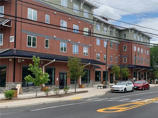 Exterior, Facade, Brick Facade, Condo Building