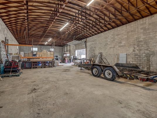 Garage, Interior, Stone Walls, Wooden Beams