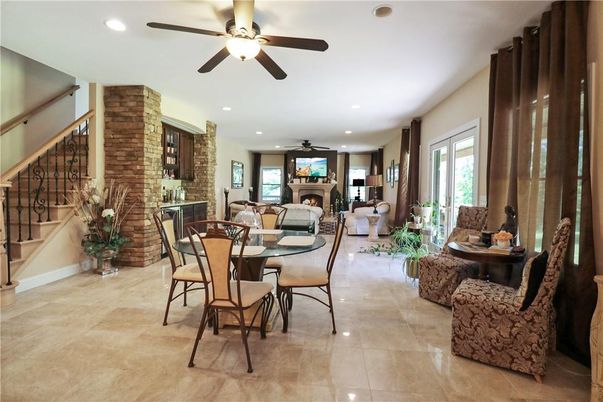 Dining room, Fireplace, Interior, Living room, Recessed Lighting, Stone Walls