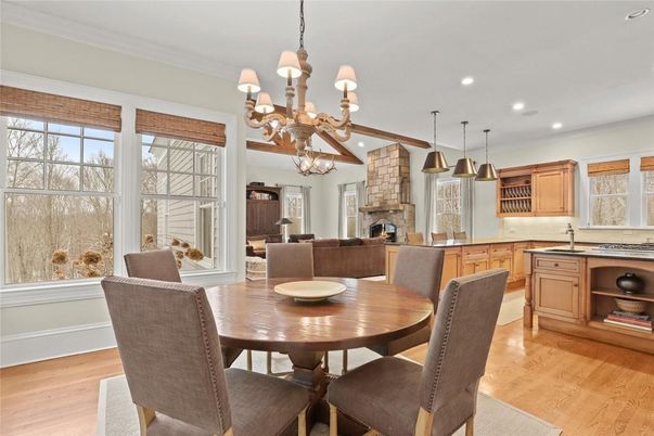 Chandelier, Dining room, Fireplace, Interior, Kitchen, Living room, Pendant Lights, Recessed Lighting, Wood Texture Flooring