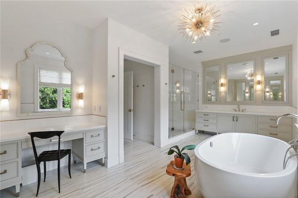 Bathroom, Dual Sink Vanities, Free Standing Baths, Glass Shower, Interior, Recessed Lighting, Wood Texture Flooring