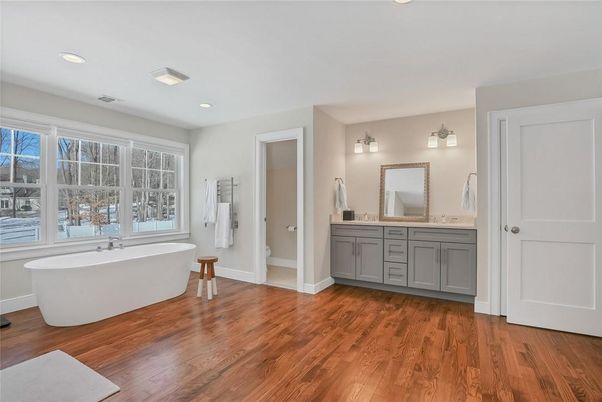 Bathroom, Dual Sink Vanities, Free Standing Baths, Interior, Recessed Lighting, Wood Texture Flooring