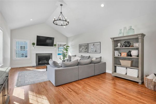 Chandelier, Fireplace, Interior, Living room, Recessed Lighting, Wood Texture Flooring