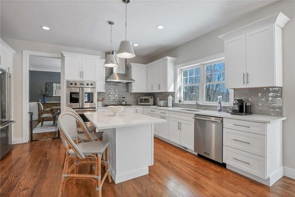 Dining room, Interior, Kitchen, Pendant Lights, Recessed Lighting, Stainless Steel Appliances, Wood Texture Flooring