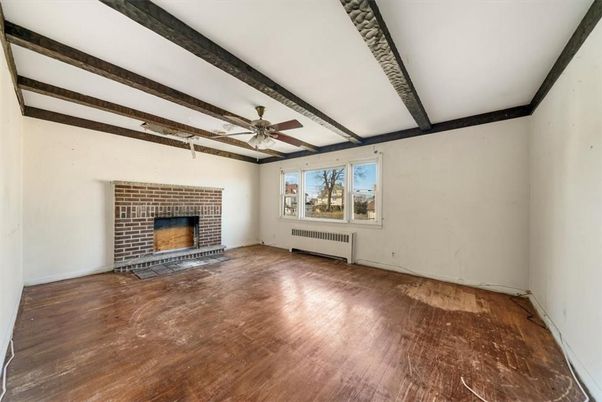Empty room, Fireplace, Interior, Stone Walls, Wooden Beams, Wood Texture Flooring