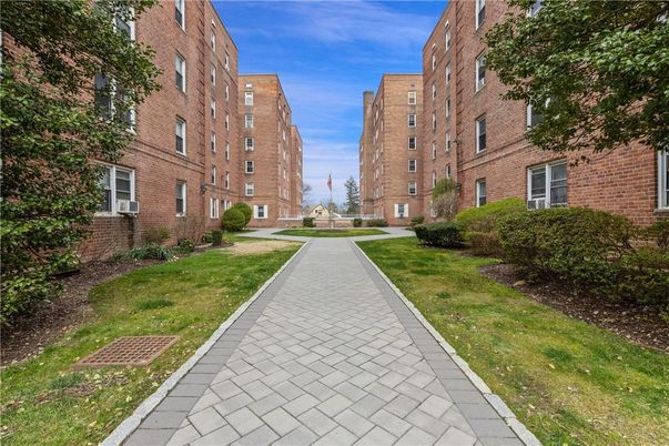 Exterior, Facade, Brick Facade, Condo Building