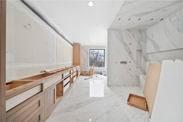 Bathroom, Dual Sink Vanities, Interior, Marble, Marble Walls, Recessed Lighting