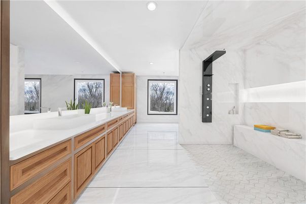 Bathroom, Dual Sink Vanities, Interior, Marble, Marble Walls, Recessed Lighting
