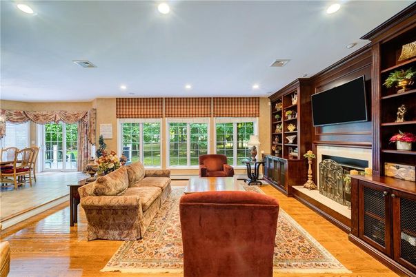 Dining room, Fireplace, Interior, Living room, Recessed Lighting, Wood Texture Flooring