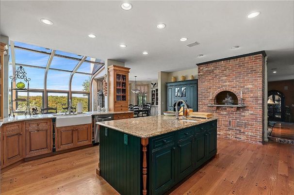 Fireplace, Glass Ceilings, Interior, Kitchen, Pendant Lights, Recessed Lighting, Stone Walls, Wood Texture Flooring