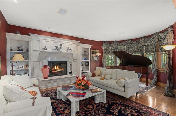 Fireplace, Interior, Living room, Piano, Recessed Lighting, Wood Texture Flooring