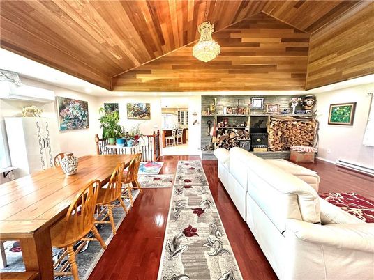 Dining room, Fireplace, Interior, Living room, Pendant Lights, Wooden Ceilings, Wood Texture Flooring