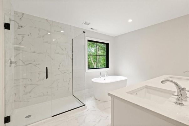 Bathroom, Dual Sink Vanities, Free Standing Baths, Glass Shower, Interior, Marble, Marble Walls, Recessed Lighting