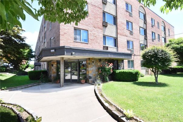 Exterior, Facade, Brick Facade, Condo Building