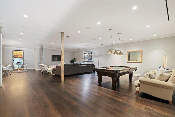 Billiard Table, Fireplace, Game Room, Interior, Living room, Pendant Lights, Recessed Lighting, Wood Texture Flooring