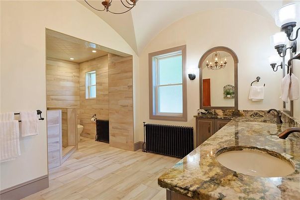 Bathroom, Chandelier, Dual Sink Vanities, Interior, Recessed Lighting, Wood Texture Flooring, Wooden Walls