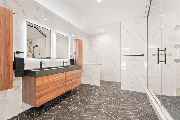 Bathroom, Dual Sink Vanities, Glass Shower, Interior, Marble Walls, Recessed Lighting
