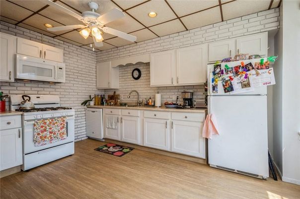 Interior, Kitchen, Recessed Lighting, Stone Walls, Wood Texture Flooring
