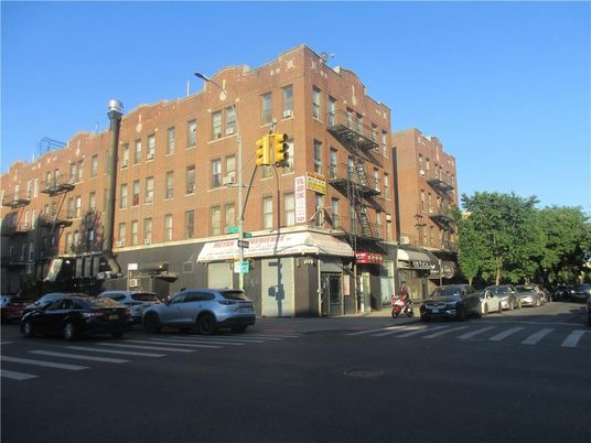 Exterior, Facade, Brick Facade, Condo Building