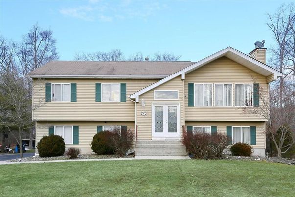 Attached, Exterior, Facade, Raised Ranch