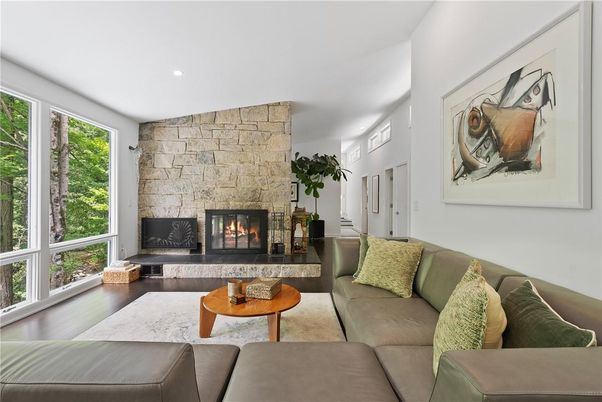 Fireplace, Interior, Living room, Recessed Lighting, Stone Walls, Wood Texture Flooring