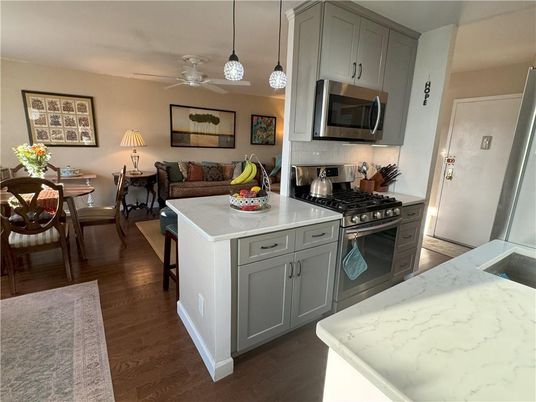 Dining room, Interior, Kitchen, Pendant Lights, Stainless Steel Appliances, Wood Texture Flooring