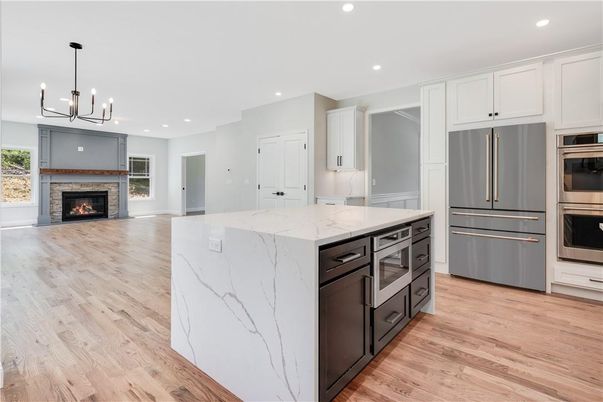 Fireplace, Interior, Kitchen, Pendant Lights, Recessed Lighting, Stainless Steel Appliances, Wood Texture Flooring