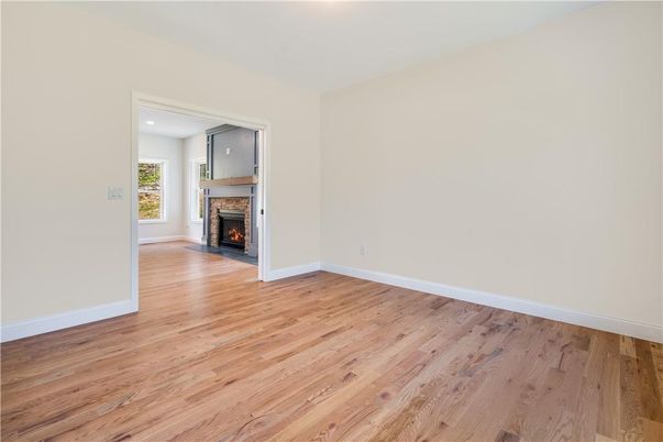 Empty room, Fireplace, Interior, Recessed Lighting, Wood Texture Flooring
