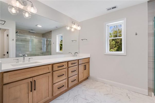 Bathroom, Dual Sink Vanities, Glass Shower, Interior, Marble, Recessed Lighting