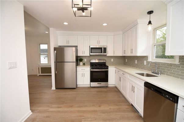 Interior, Kitchen, Pendant Lights, Recessed Lighting, Stainless Steel Appliances, Wood Texture Flooring