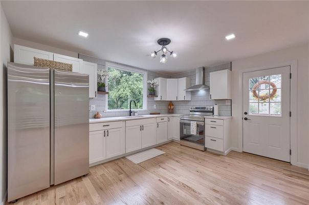 Interior, Kitchen, Recessed Lighting, Stainless Steel Appliances, Wood Texture Flooring