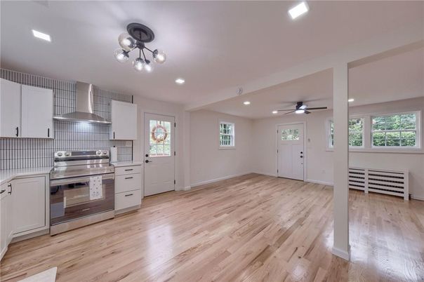 Interior, Kitchen, Recessed Lighting, Stainless Steel Appliances, Wood Texture Flooring