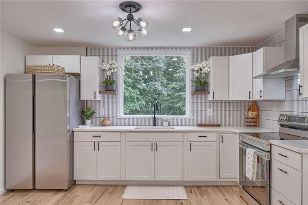 Interior, Kitchen, Pendant Lights, Recessed Lighting, Stainless Steel Appliances, Wood Texture Flooring