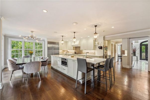 Dining room, Interior, Kitchen, Pendant Lights, Recessed Lighting, Stainless Steel Appliances, Wood Texture Flooring