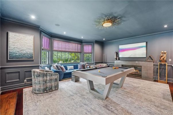 Billiard Table, Fireplace, Game Room, Interior, Living room, Recessed Lighting, Wood Texture Flooring