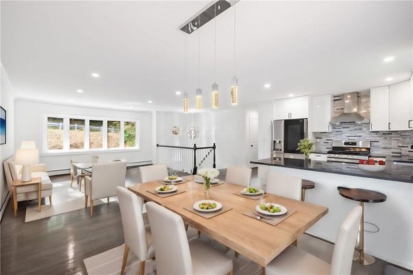 Dining room, Interior, Kitchen, Pendant Lights, Recessed Lighting, Stainless Steel Appliances, Wood Texture Flooring