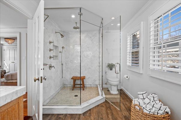 Bathroom, Glass Shower, Interior, Marble Walls, Recessed Lighting, Wood Texture Flooring