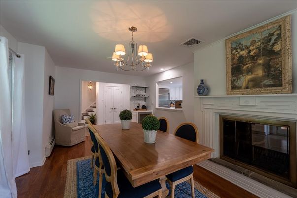Chandelier, Dining room, Fireplace, Interior, Recessed Lighting, Wood Texture Flooring