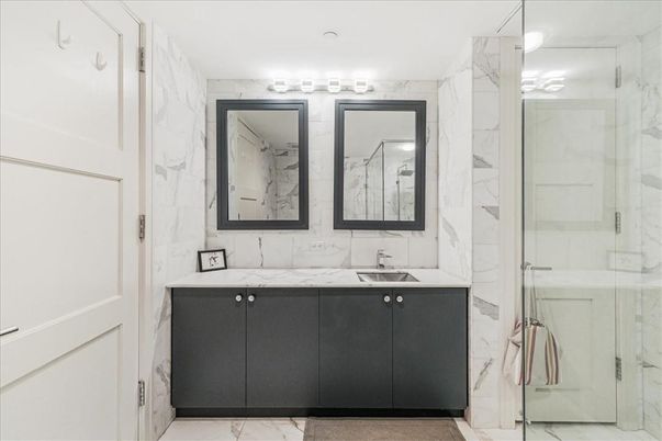 Bathroom, Dual Sink Vanities, Glass Shower, Interior, Marble, Marble Walls