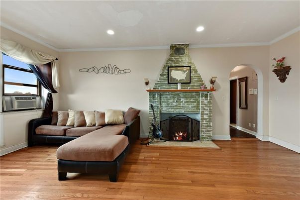 Fireplace, Interior, Recessed Lighting, Wood Texture Flooring