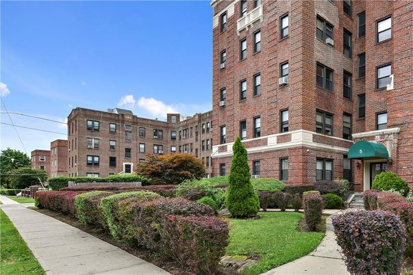Exterior, Facade, Brick Facade, Condo Building