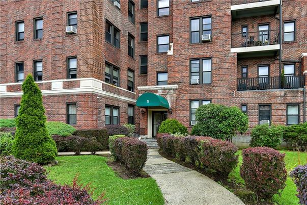 Exterior, Facade, Brick Facade, Condo Building