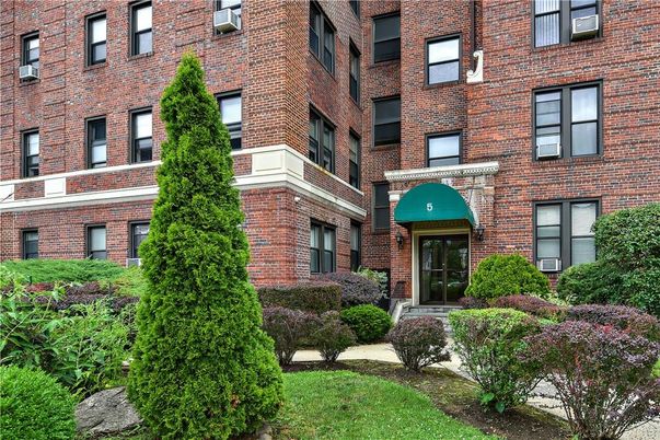 Exterior, Facade, Brick Facade, Condo Building