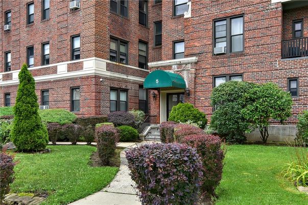 Exterior, Facade, Brick Facade, Condo Building