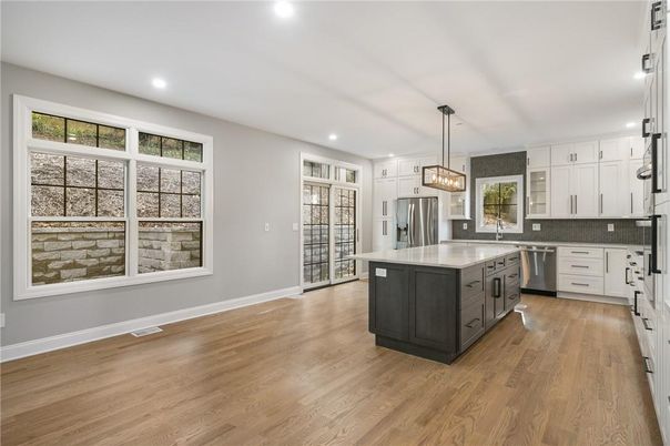 Interior, Kitchen, Pendant Lights, Recessed Lighting, Stainless Steel Appliances, Wood Texture Flooring