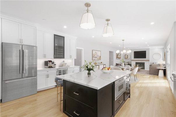 Dining room, Fireplace, Interior, Kitchen, Living room, Pendant Lights, Recessed Lighting, Stainless Steel Appliances, Wood Texture Flooring